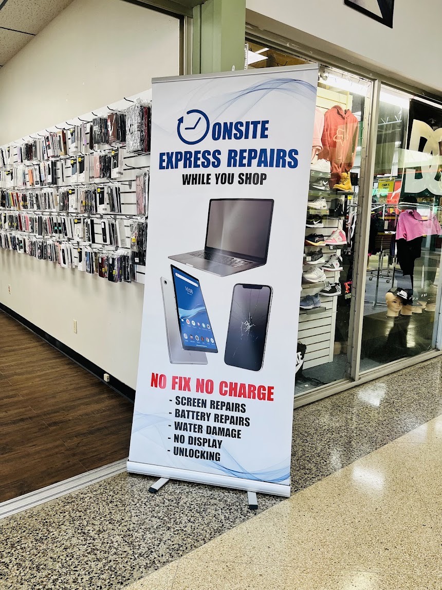 Sam Tech Plus repair banner in the mall